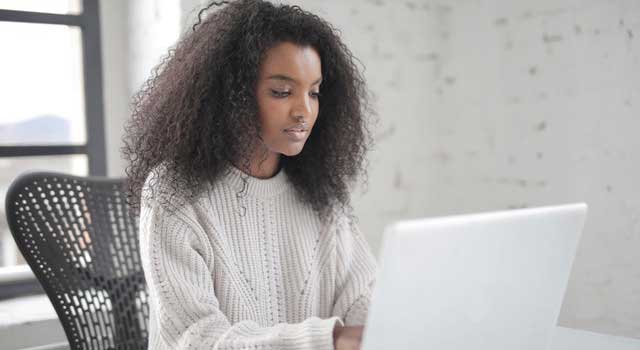 photo-of-woman-using-laptop