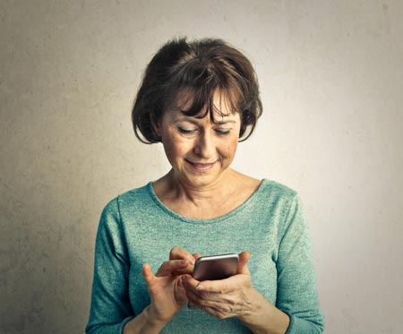 elder woman using smartphone