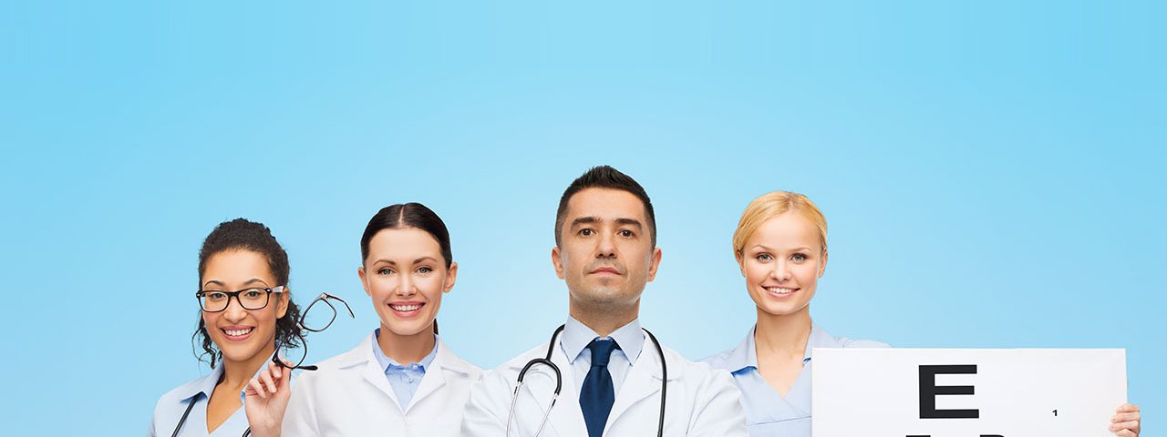 group of doctors with eye chart and glasses